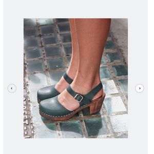 Lotta from Stockholm Highwood Dark Green Clogs on Brown Base